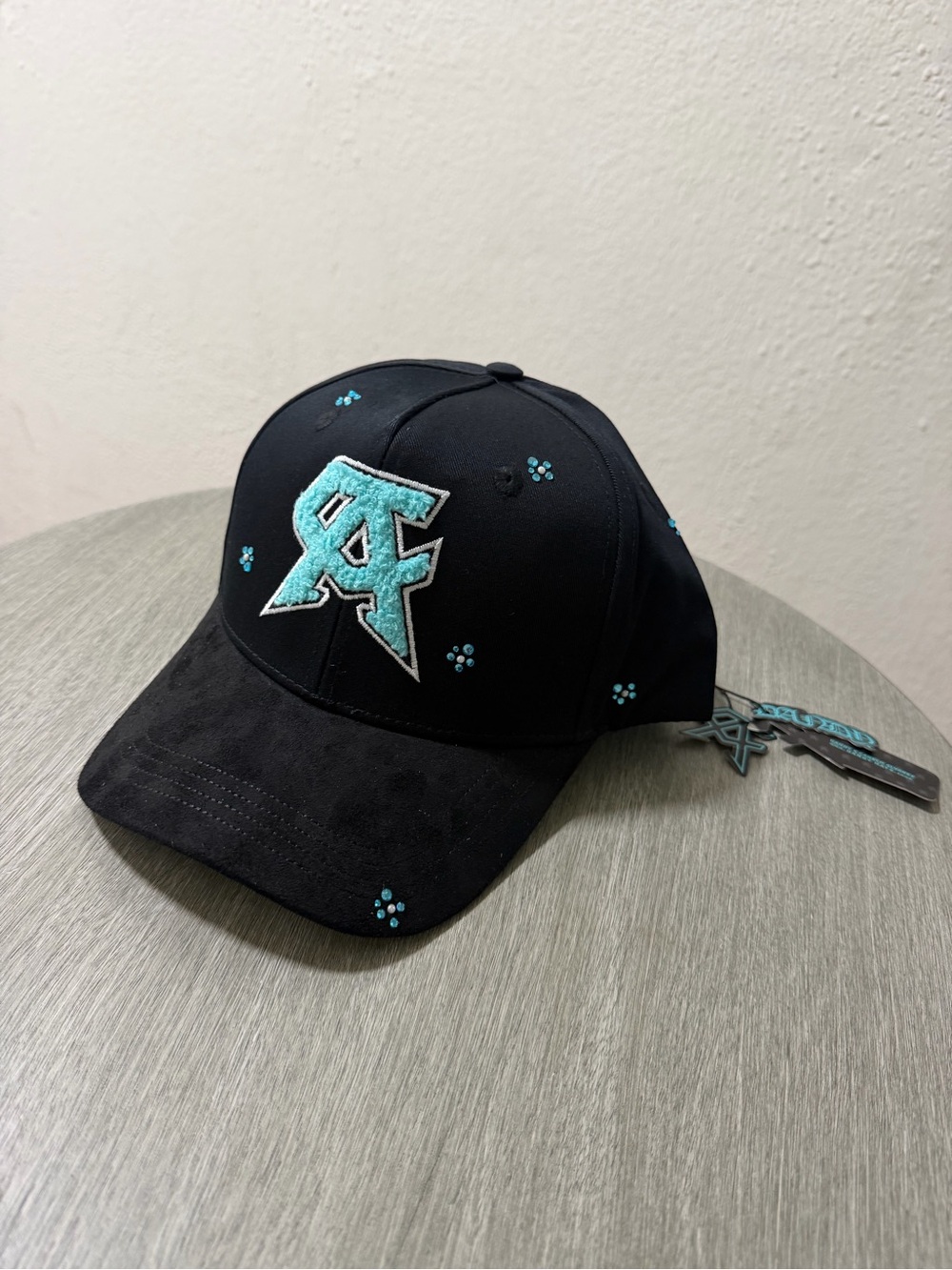 Canelo dandy Black Baseball Cap with Teal Logo